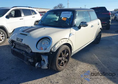 2009 Mini Cooper S z USA, uszkodzony, nr VIN WMWMF73589TW85437
